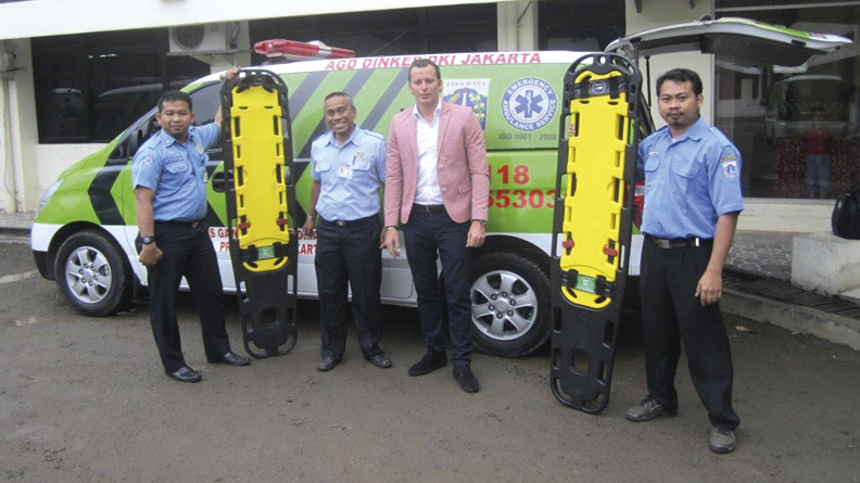 Spencer Tango with rescue workers in Jakarta