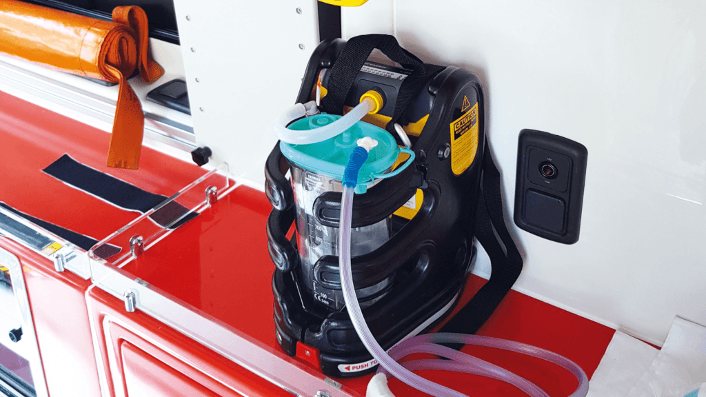 Spencer Ambujet portable suction units into ambulance